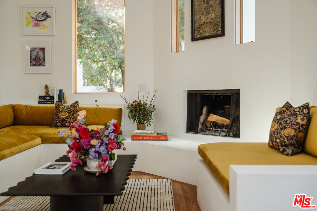 2002 Tuna Canyon Road Topanga, CA 90290 - Photo 2 of 70 a living room with furniture and a potted plant