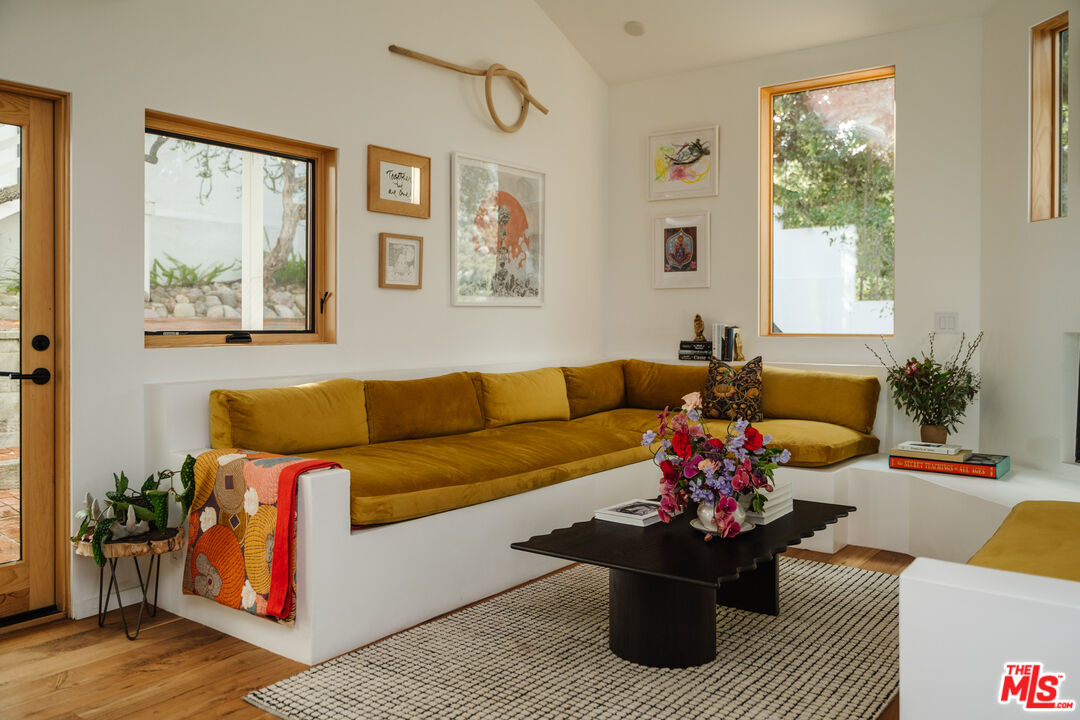2002 Tuna Canyon Road Topanga, CA 90290 - Photo 3 of 70 a living room with furniture and a potted plant