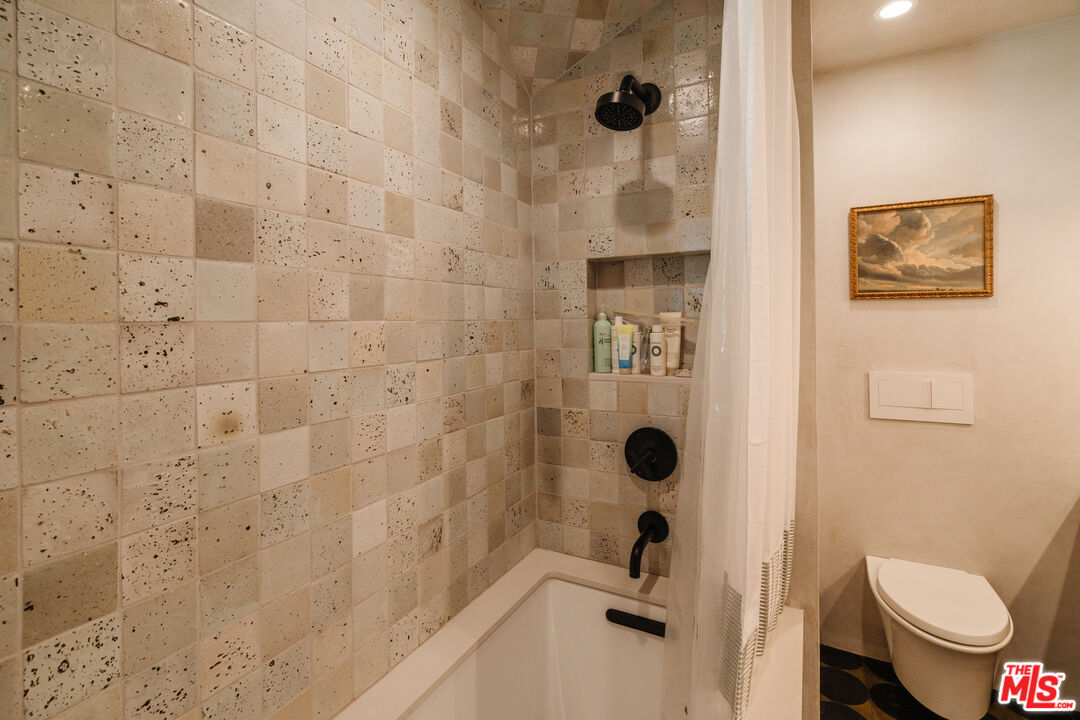 2002 Tuna Canyon Road Topanga, CA 90290 - Photo 44 of 70 a bathroom with a toilet and a shower