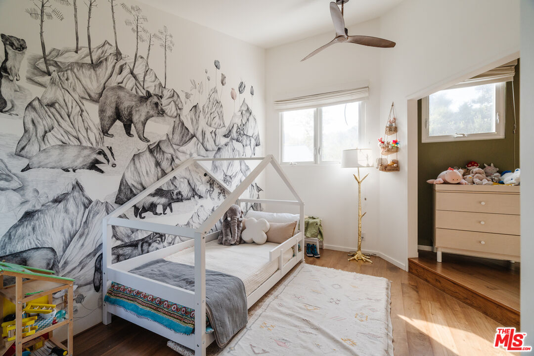 2002 Tuna Canyon Road Topanga, CA 90290 - Photo 47 of 70 a spacious bedroom with a bed and a window
