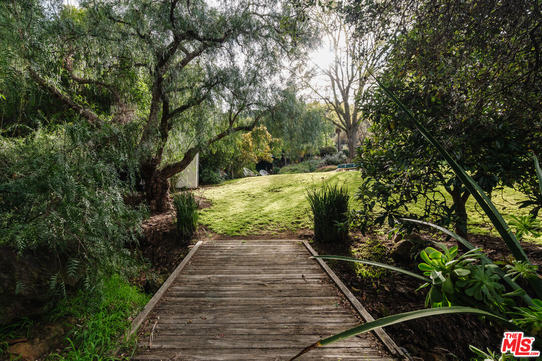 2002 Tuna Canyon Road Topanga, CA 90290 - Photo 53 of 70 a backyard of a house with lots of green space