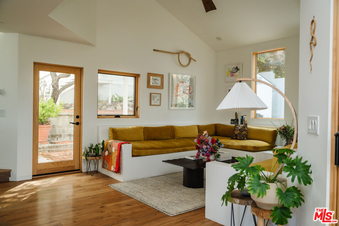 2002 Tuna Canyon Road Topanga, CA 90290 - Photo 64 of 70 a living room with furniture and a potted plant