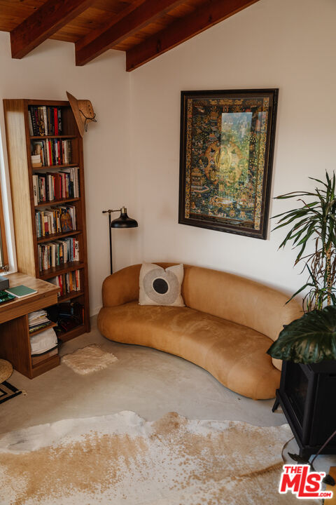 2002 Tuna Canyon Road Topanga, CA 90290 - Photo 67 of 70 a bedroom with a bed and a book shelf