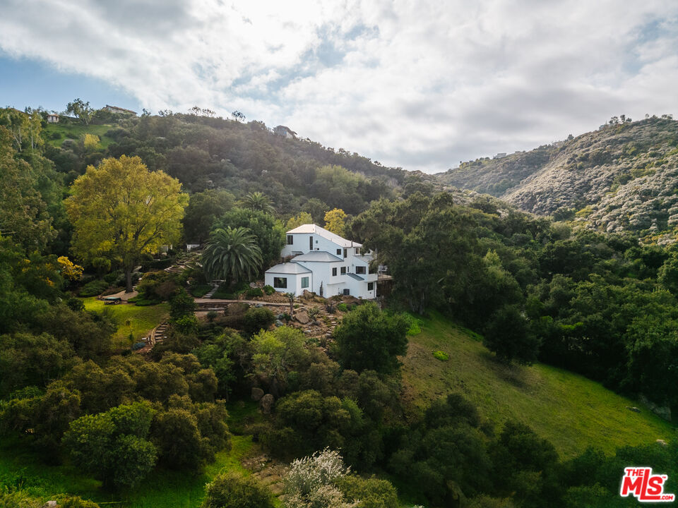2002 Tuna Canyon Road Topanga, CA 90290 - Photo 69 of 70 a view of a house with a mountain in the background