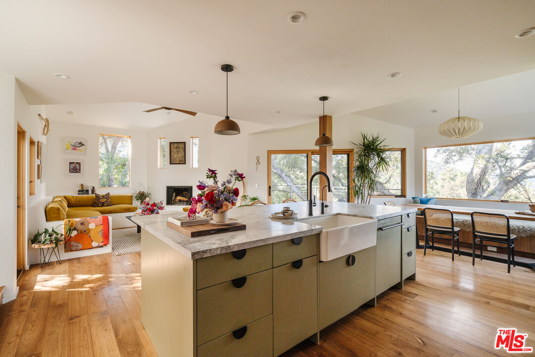 2002 Tuna Canyon Road Topanga, CA 90290 - Photo 10 of 70 a kitchen that has a lot of cabinets in it