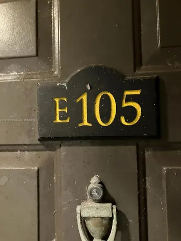 a view of a kitchen from the hallway