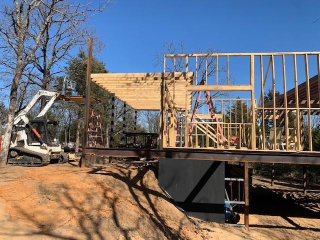 924 The Oil Road Gainesville, TX 76240 - Photo 26 of 39 Erecting Walls and Roof