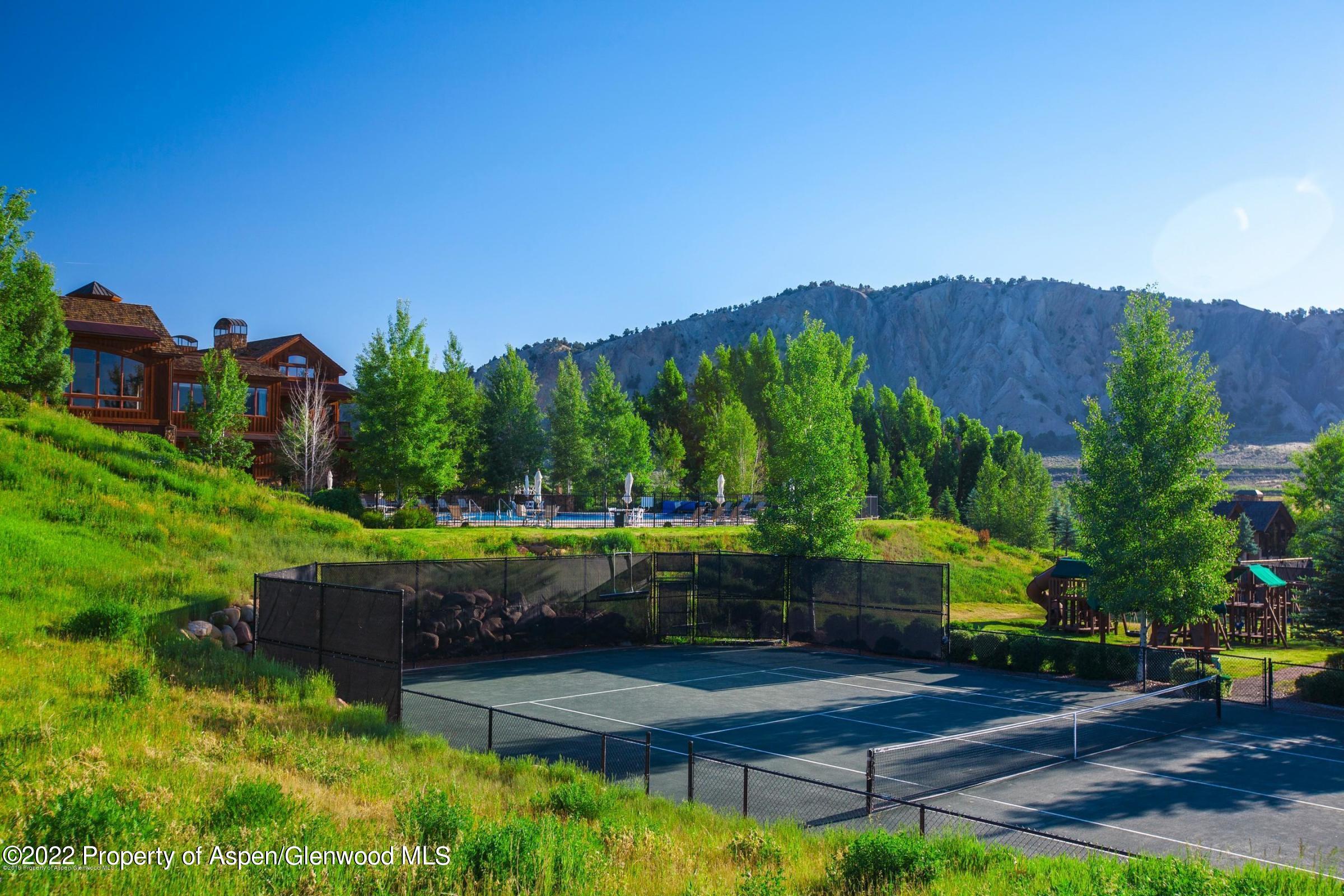Tbd Midland Loop, Unit WP4 Carbondale, CO 81623 - Photo 20 of 24 a view of swimming pool outdoor seating and trees in the background
