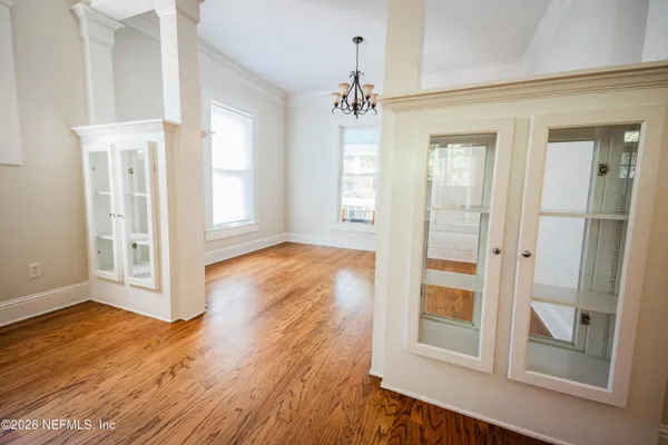 a view of a room with a flat screen tv