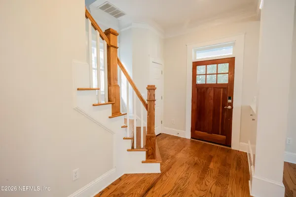 a view of a hallway with windows