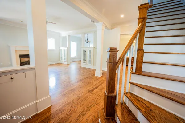 a bathroom with a toilet sink vanity tub and shower