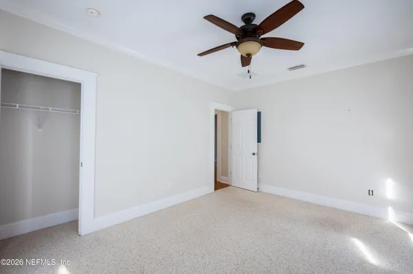 a view of a room with racks on the wall