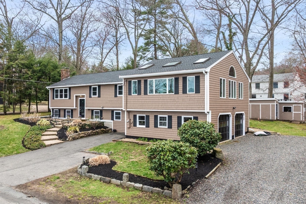 187 Echo Cove Road Hamilton, MA 01982 - Photo 1 of 42 front view of a house with a yard