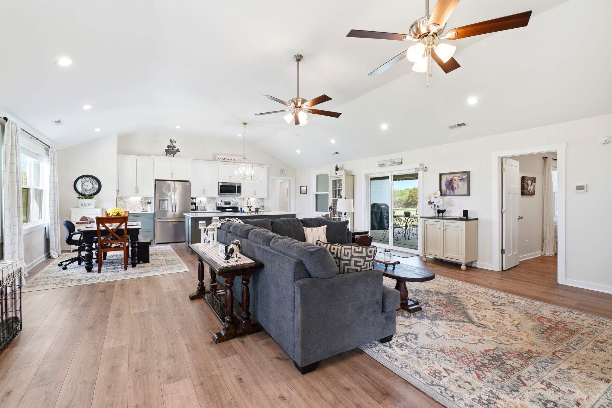 600 Squire Hall Road Shelbyville, TN 37160 - Photo 13 of 69 a living room with furniture kitchen view and a wooden floor