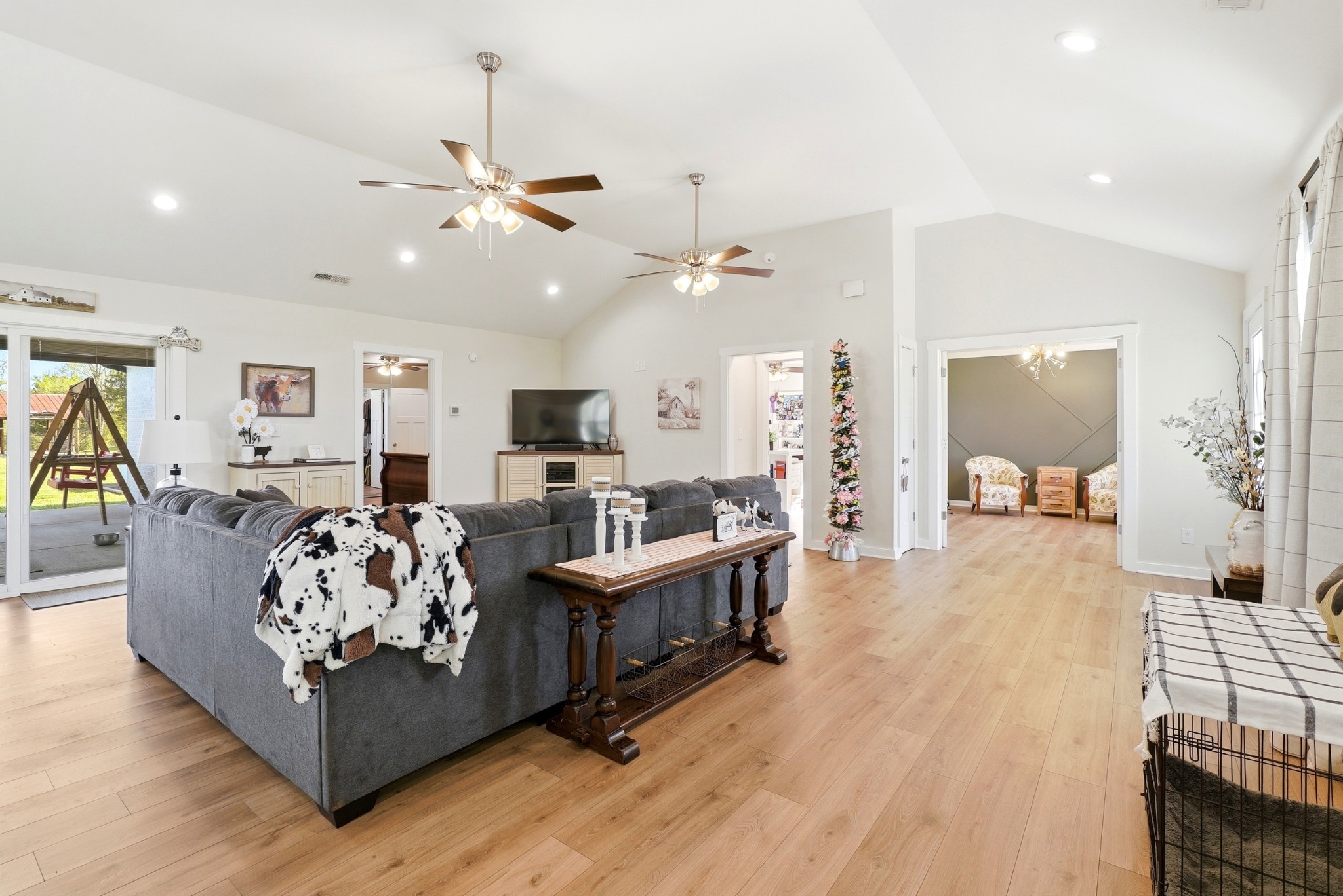 600 Squire Hall Road Shelbyville, TN 37160 - Photo 14 of 69 a living room with furniture kitchen view and a chandelier