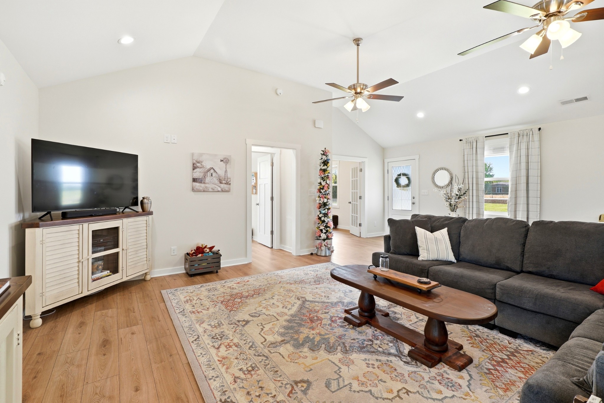 600 Squire Hall Road Shelbyville, TN 37160 - Photo 16 of 69 a living room with furniture and a flat screen tv