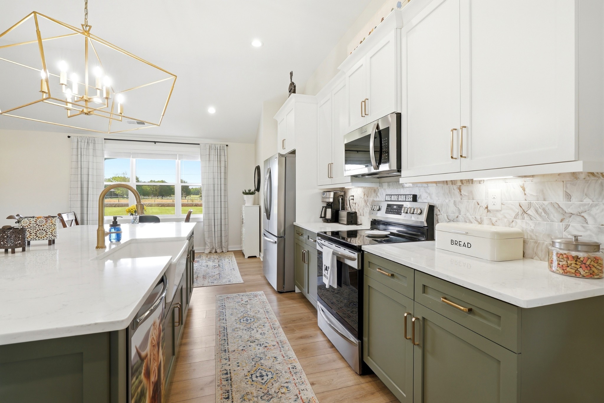 600 Squire Hall Road Shelbyville, TN 37160 - Photo 19 of 69 a kitchen with a sink stove and refrigerator