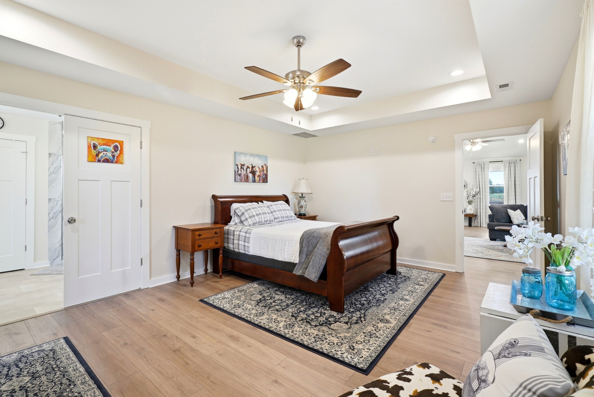 600 Squire Hall Road Shelbyville, TN 37160 - Photo 33 of 69 a bedroom with a bed a couches and a potted plant