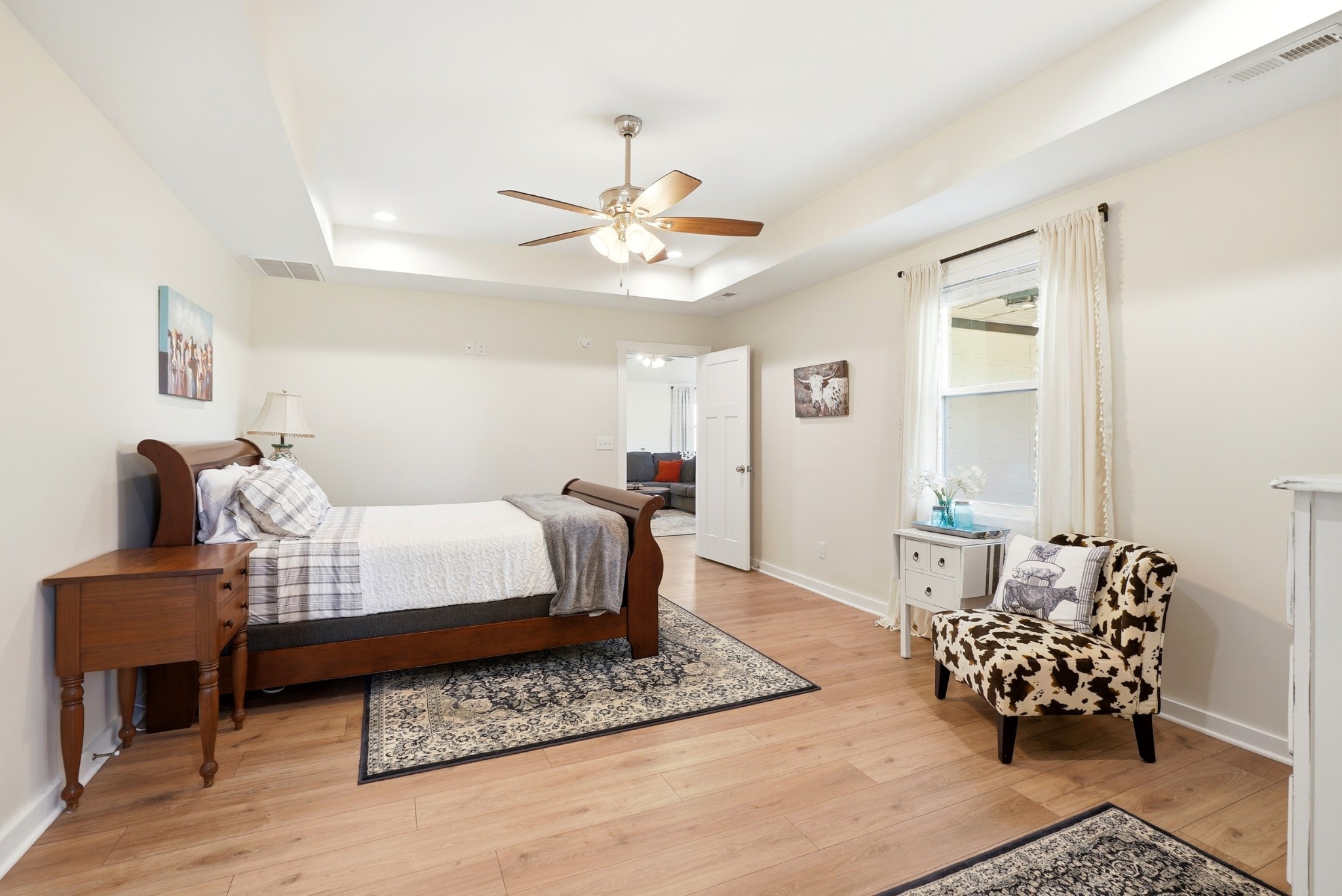 600 Squire Hall Road Shelbyville, TN 37160 - Photo 34 of 69 a bedroom with a bed and wooden floor