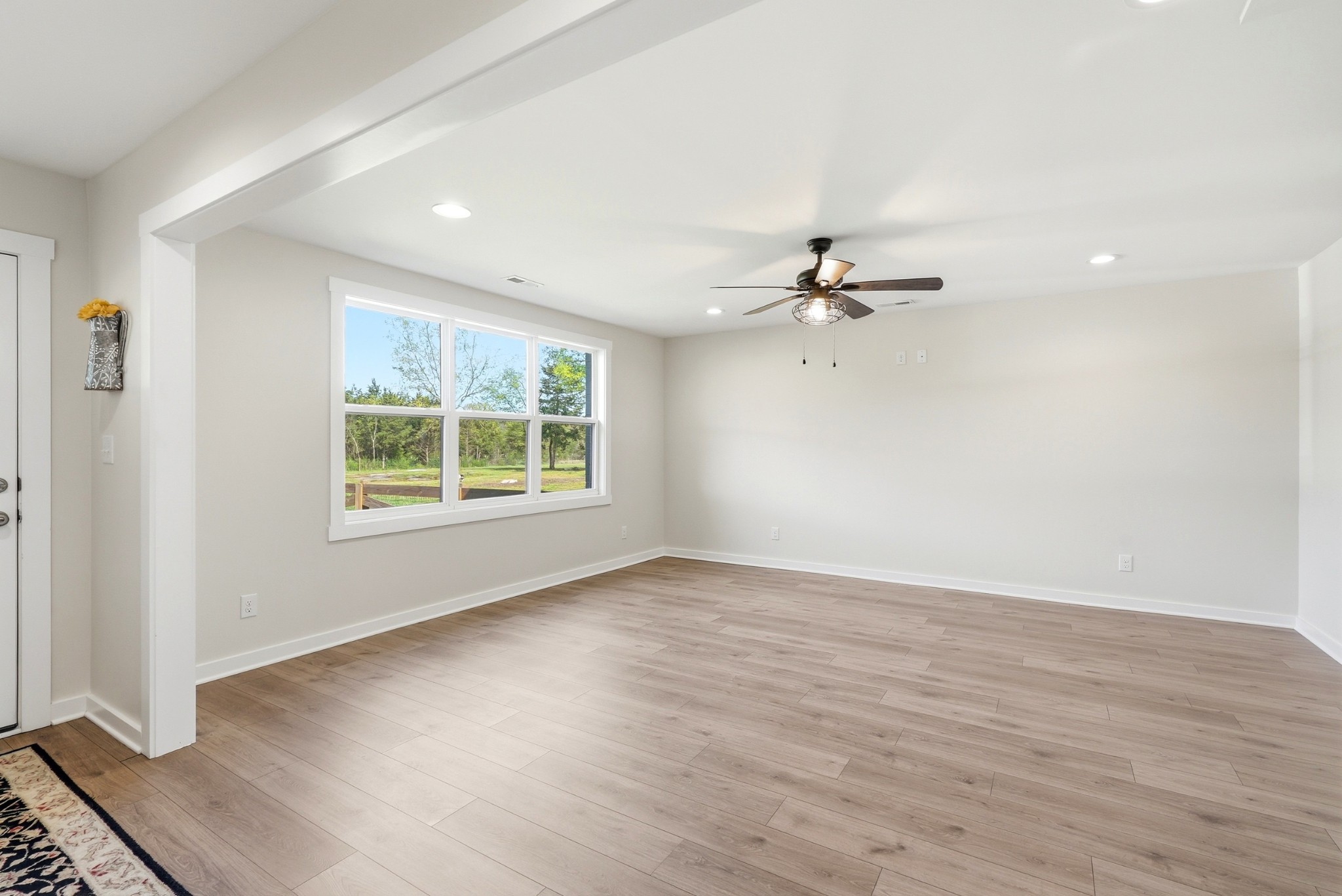 600 Squire Hall Road Shelbyville, TN 37160 - Photo 48 of 69 wooden floor in an empty room with a window