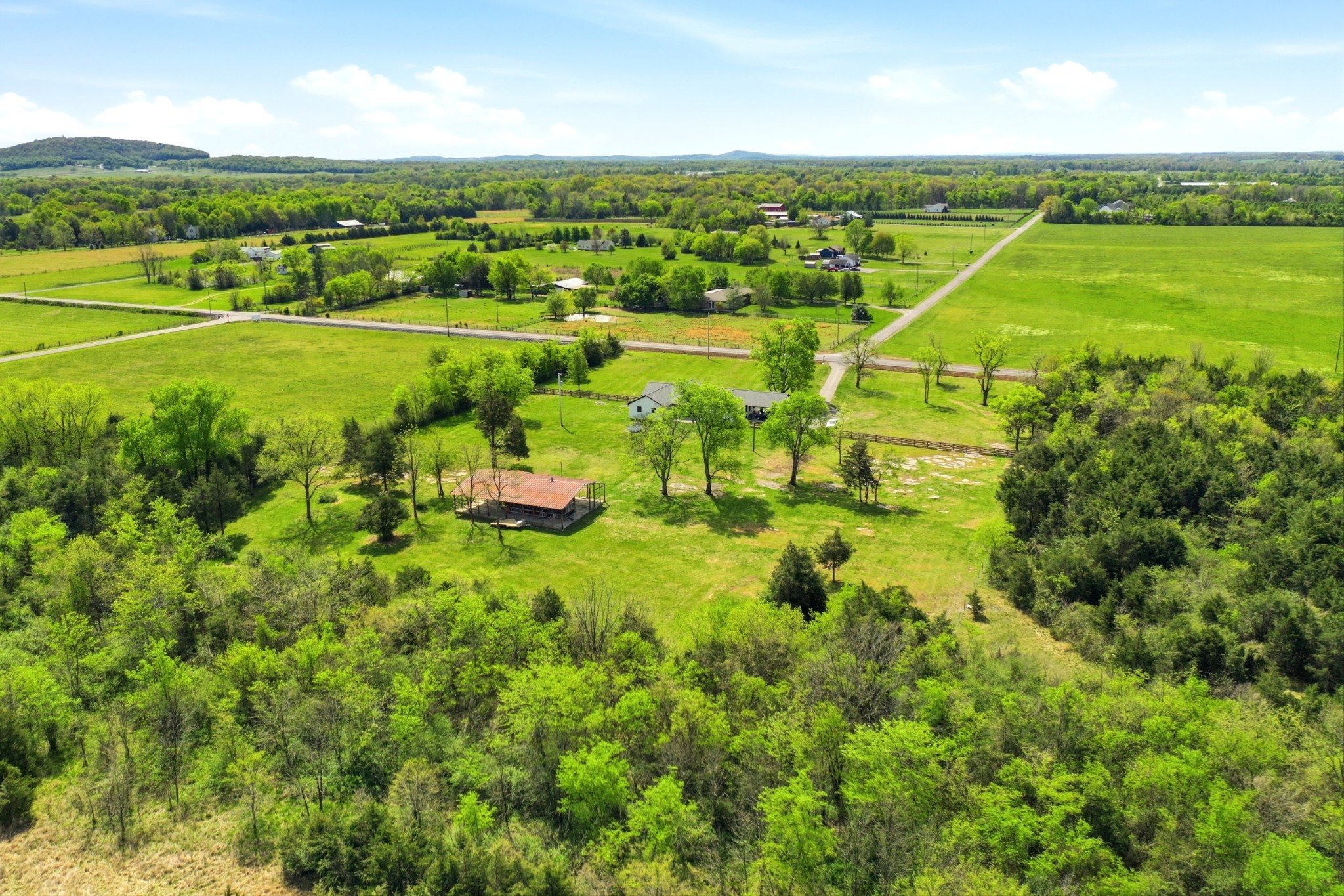 600 Squire Hall Road Shelbyville, TN 37160 - Photo 57 of 69 an aerial view of a houses with outdoor space and a lake view