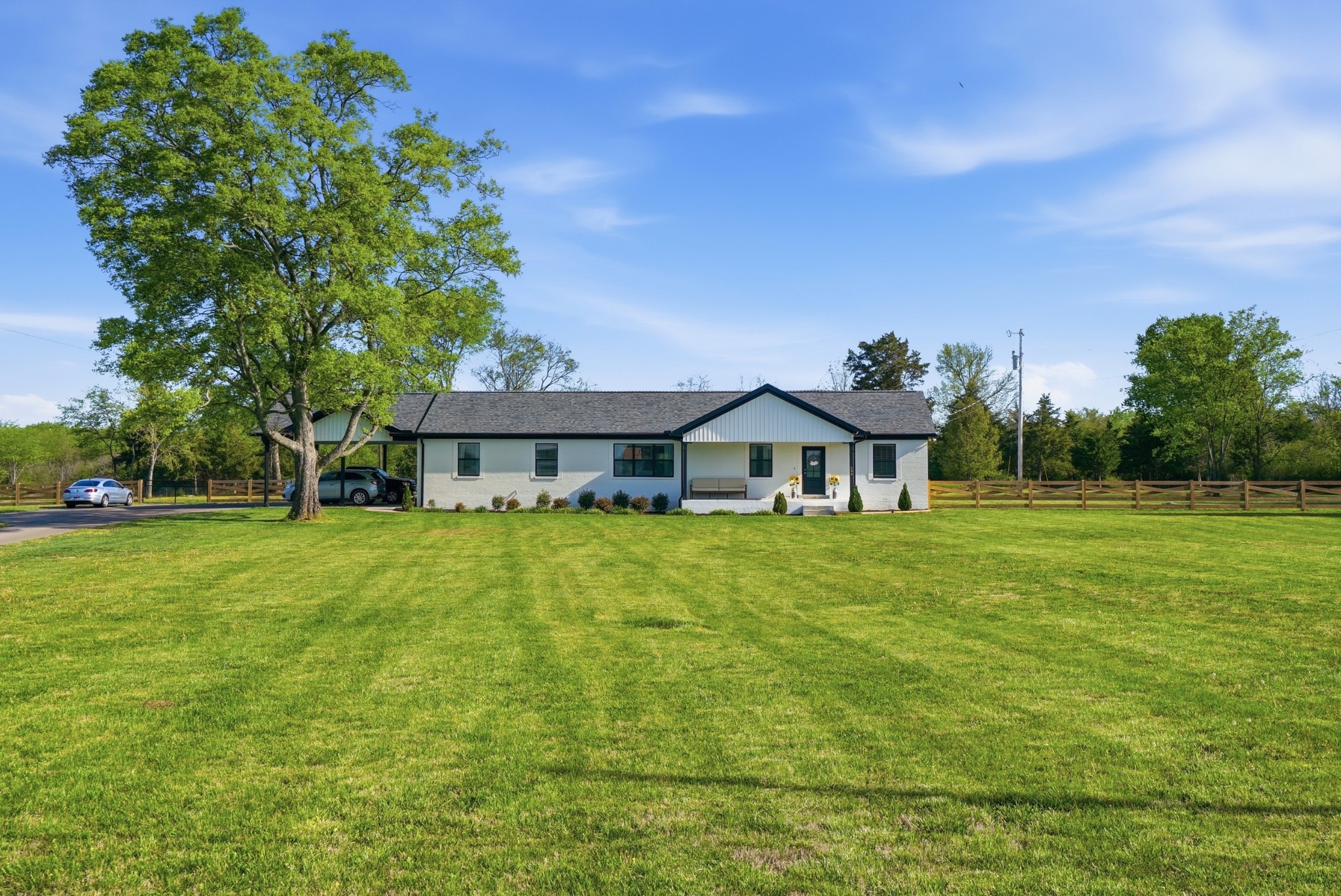 600 Squire Hall Road Shelbyville, TN 37160 - Photo 67 of 69 a front view of a house with a garden