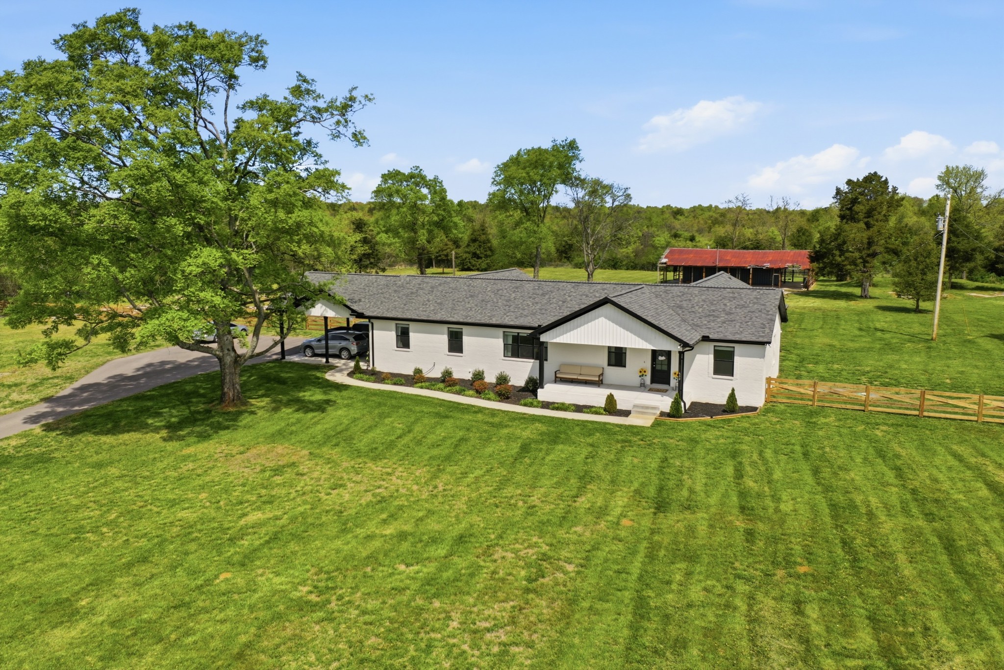 600 Squire Hall Road Shelbyville, TN 37160 - Photo 8 of 69 a aerial view of a house with swimming pool next to a big yard