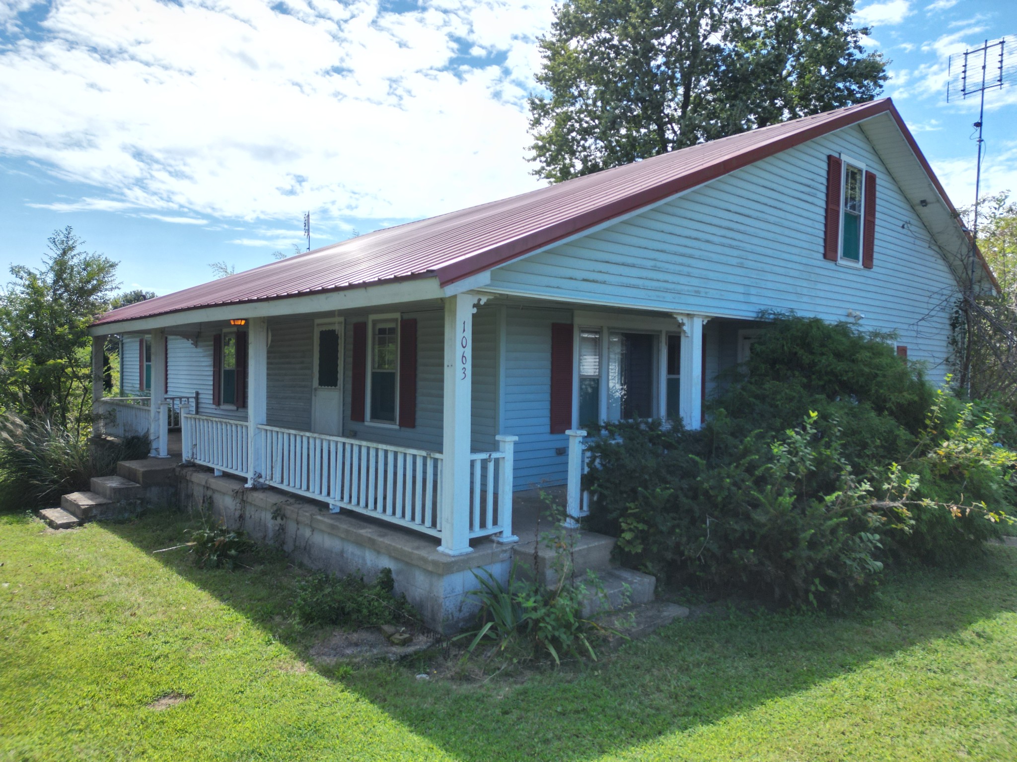 1063 Rabbit Trail Road Five Points, TN 38457 - Photo 1 of 57 a view of a house with garden and yard