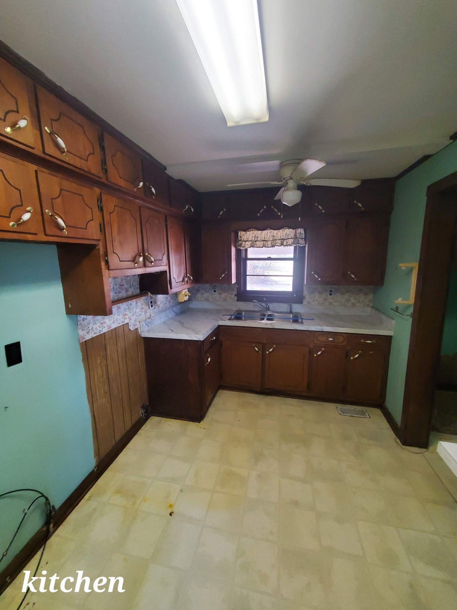 1063 Rabbit Trail Road Five Points, TN 38457 - Photo 12 of 57 a large kitchen with kitchen island granite countertop a sink a counter space and cabinets