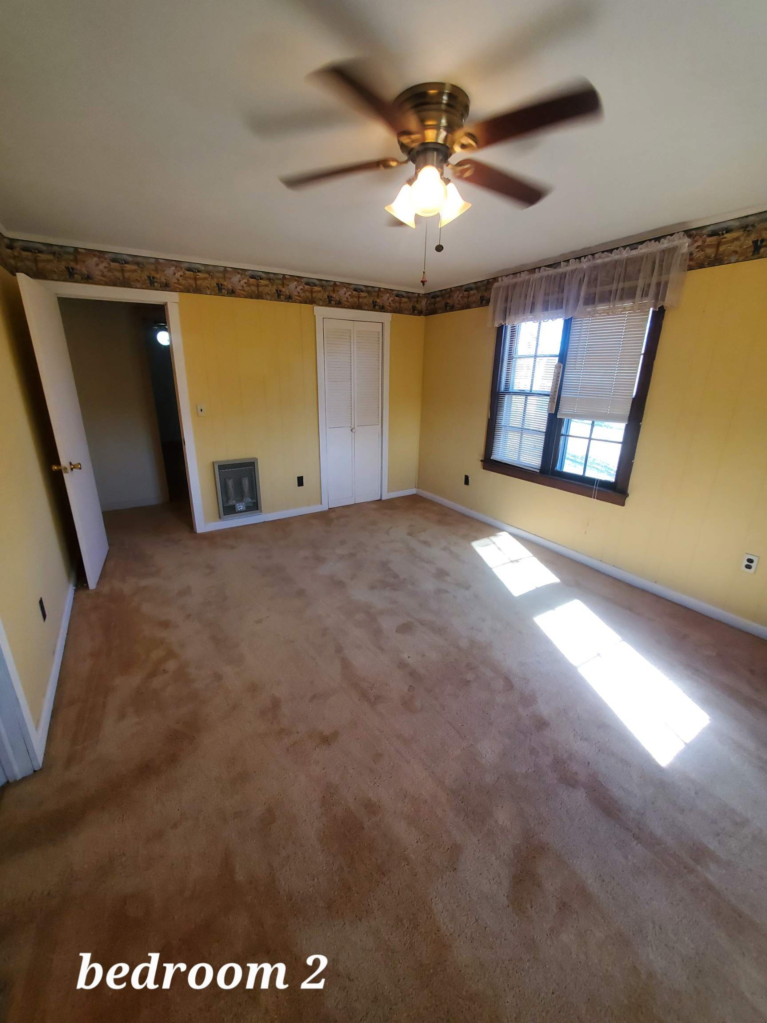 1063 Rabbit Trail Road Five Points, TN 38457 - Photo 36 of 57 en empty room with windows and chandelier