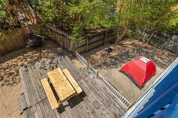 a view of a wooden floor with a bench