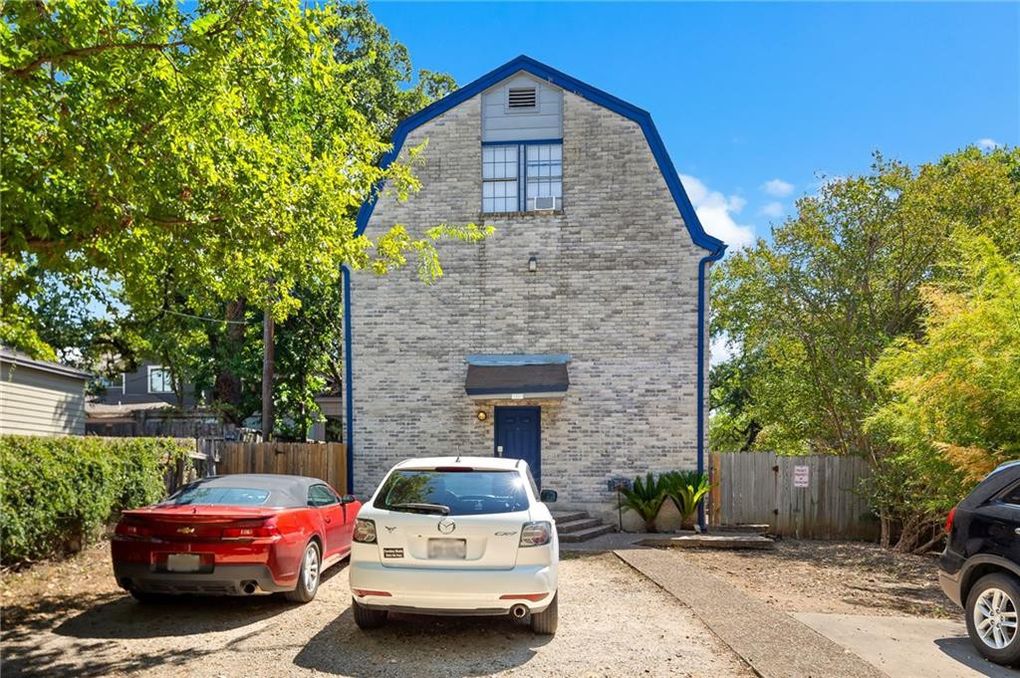 3104 Cedar Street, Unit 4 Austin, TX 78705 - Photo 2 of 18 a car parked in front of a house
