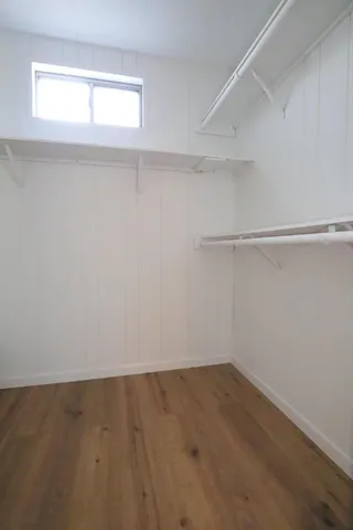 a bathroom with a bathtub and a sink