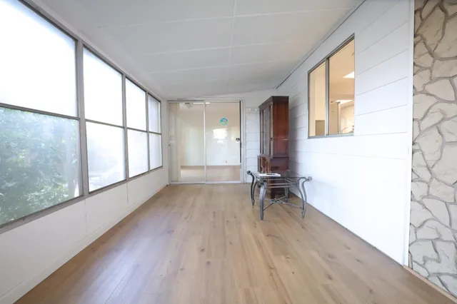 a view of yard with patio