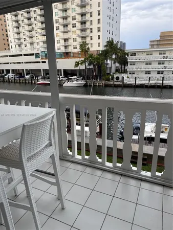 a view of balcony with outdoor seating