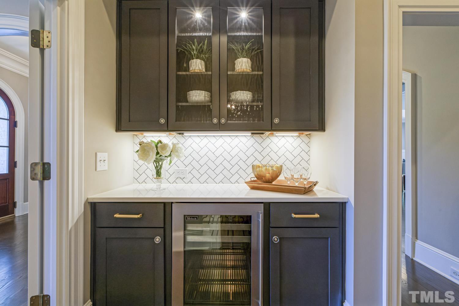 2642 Churchill Road Raleigh, NC 27608 - Photo 13 of 98 a bathroom with a granite countertop sink and a mirror