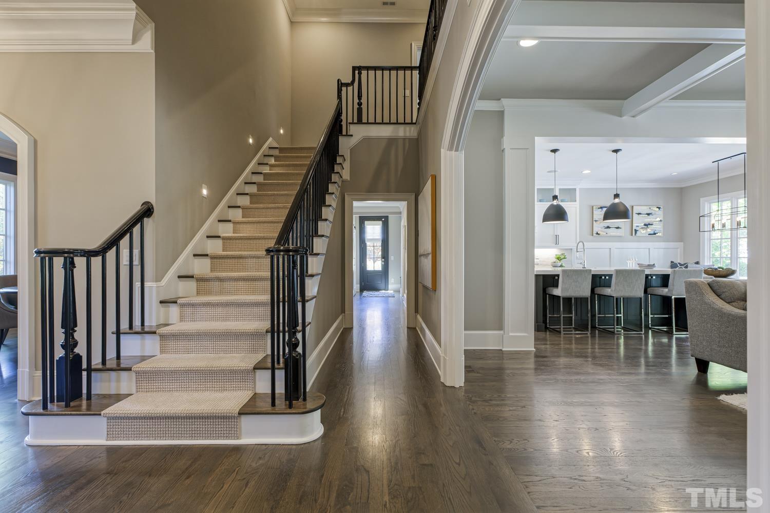 2642 Churchill Road Raleigh, NC 27608 - Photo 17 of 98 a view of entryway and hall with wooden floor