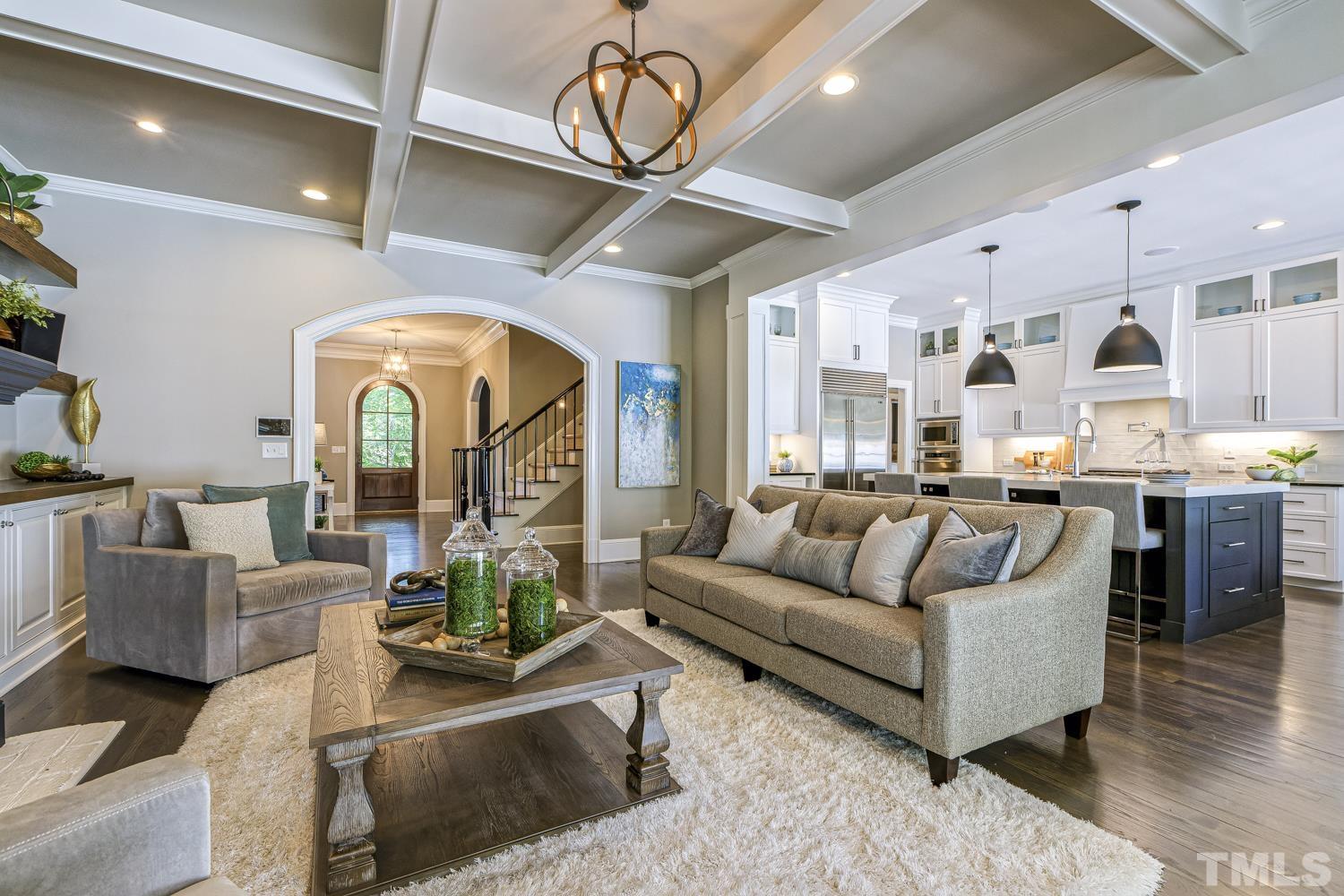 2642 Churchill Road Raleigh, NC 27608 - Photo 21 of 98 a living room with furniture and a large window