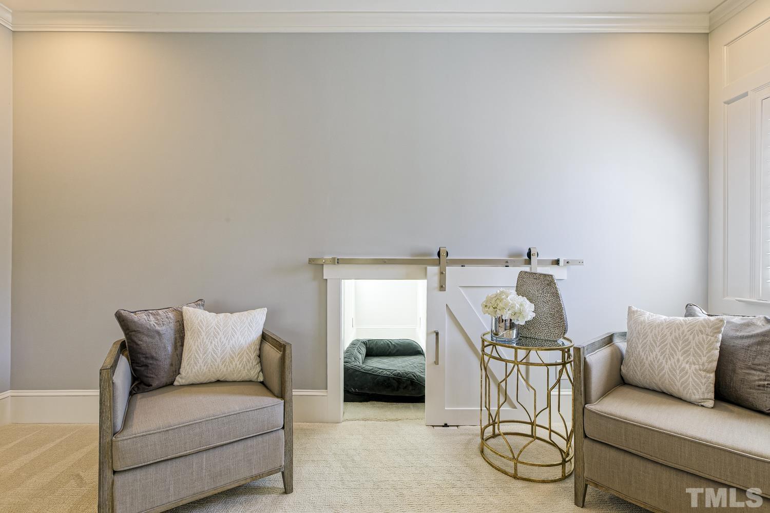 2642 Churchill Road Raleigh, NC 27608 - Photo 52 of 98 a living room with furniture and a window