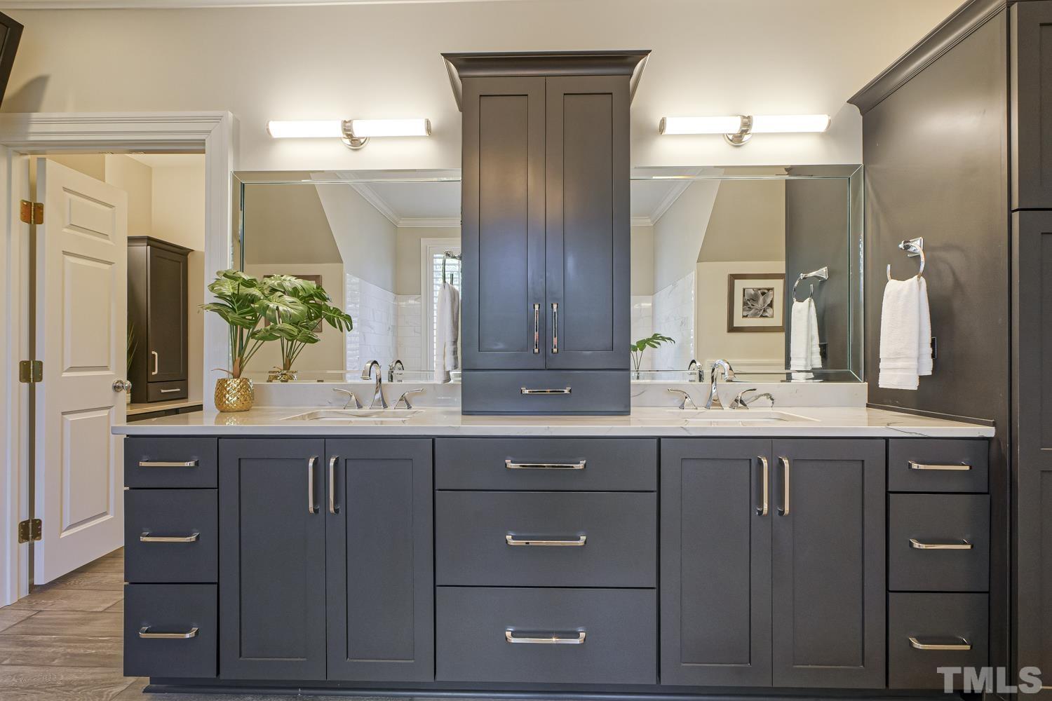 2642 Churchill Road Raleigh, NC 27608 - Photo 58 of 98 a bathroom with a granite countertop sink and a mirror