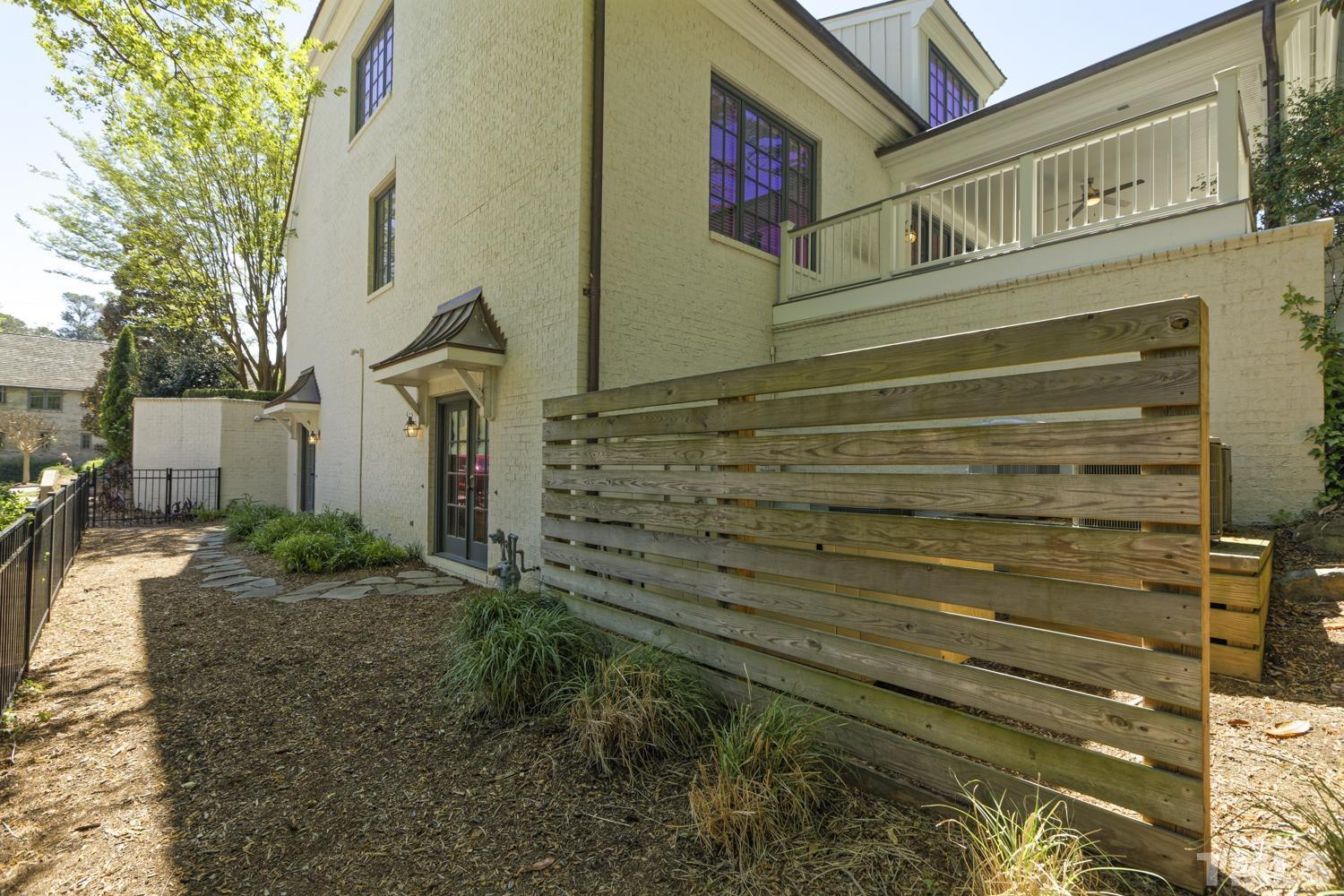 2642 Churchill Road Raleigh, NC 27608 - Photo 89 of 98 a view of a house with a backyard