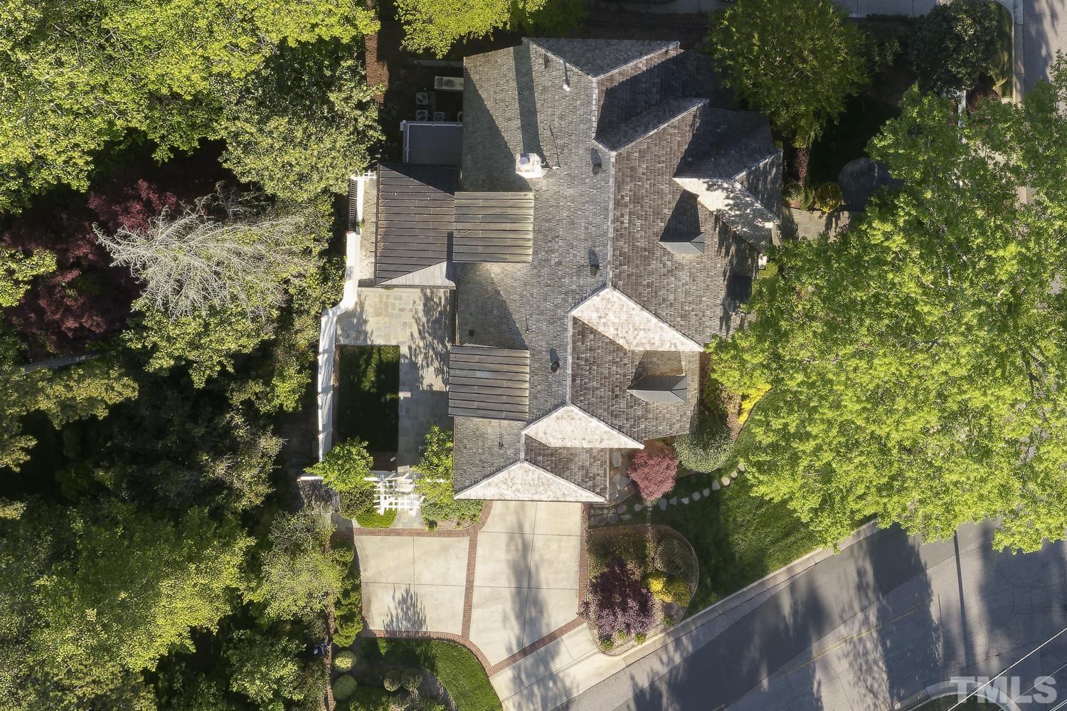 2642 Churchill Road Raleigh, NC 27608 - Photo 98 of 98 an aerial view of residential house with outdoor space