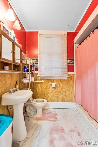 a bathroom with a sink a mirror and a bathtub