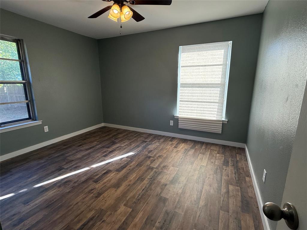 606 Colonial Drive Athens, TX 75751 - Photo 8 of 12 a view of an empty room and window