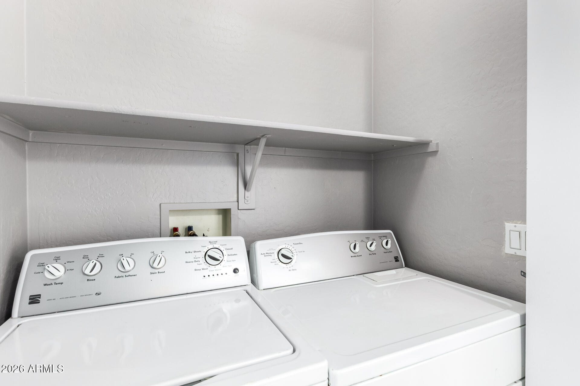 2150 East Bell Road, Unit 1075 Phoenix, AZ 85022 - Photo 33 of 45 a utility room with washer and dryer