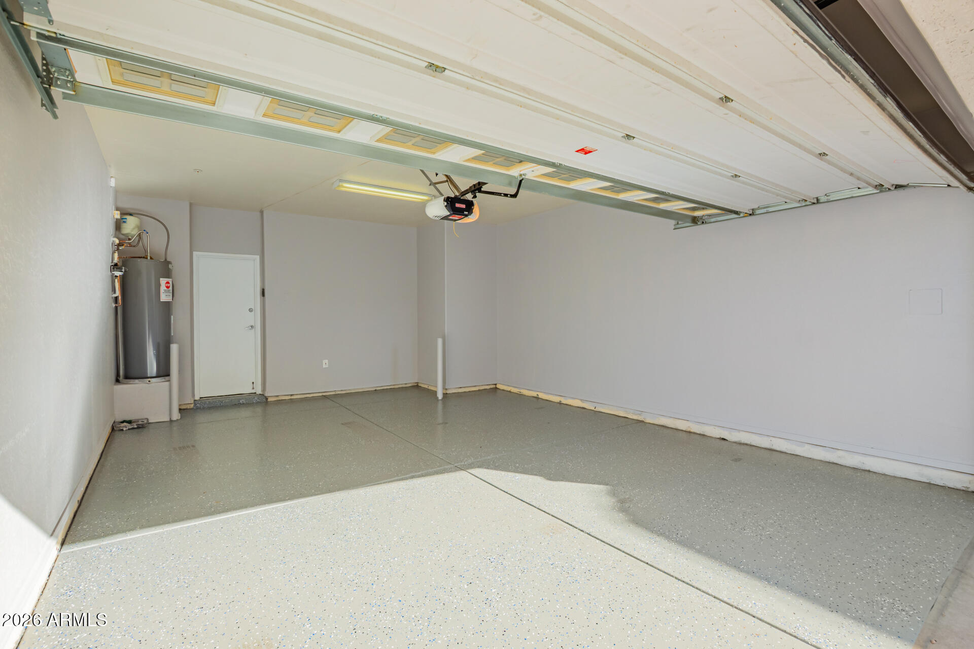 2150 East Bell Road, Unit 1075 Phoenix, AZ 85022 - Photo 34 of 45 a view of a room with rack on the wall