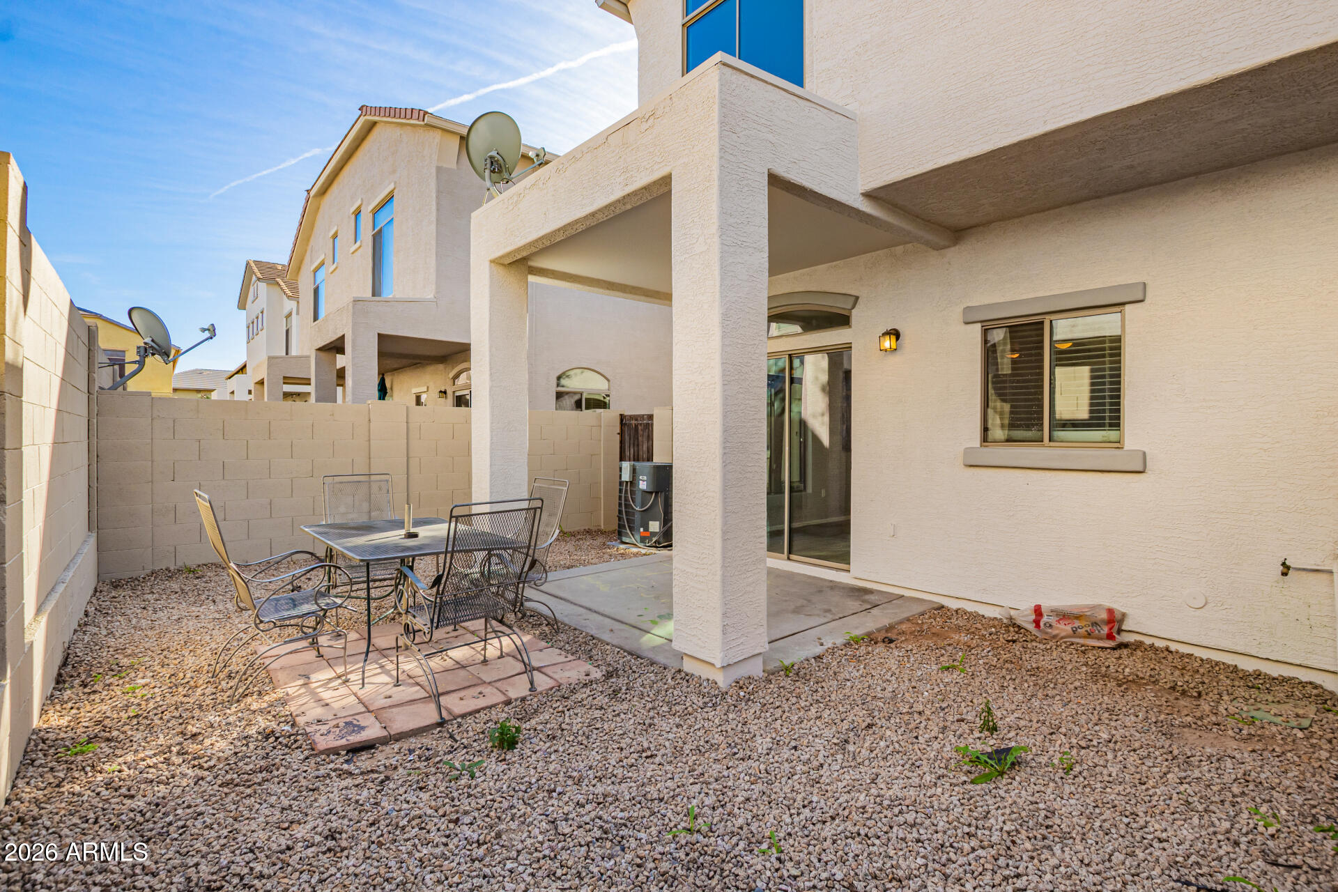 2150 East Bell Road, Unit 1075 Phoenix, AZ 85022 - Photo 38 of 45 a view of a livingroom with furniture and a refrigerator