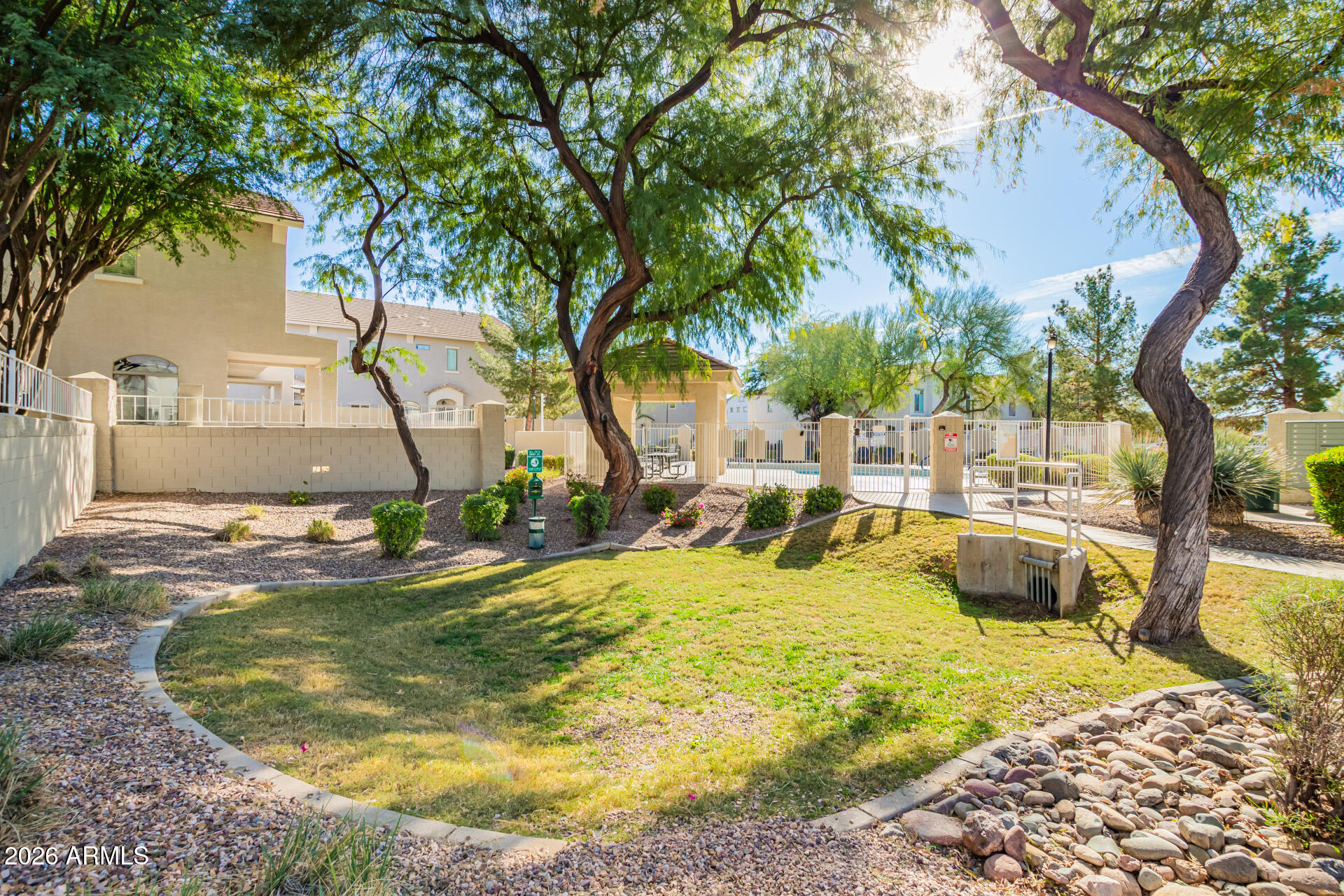 2150 East Bell Road, Unit 1075 Phoenix, AZ 85022 - Photo 40 of 45 a view of a swimming pool with a patio