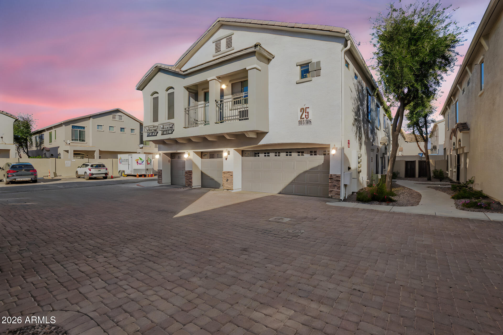 2150 East Bell Road, Unit 1075 Phoenix, AZ 85022 - Photo 45 of 45 a front view of a house with a yard