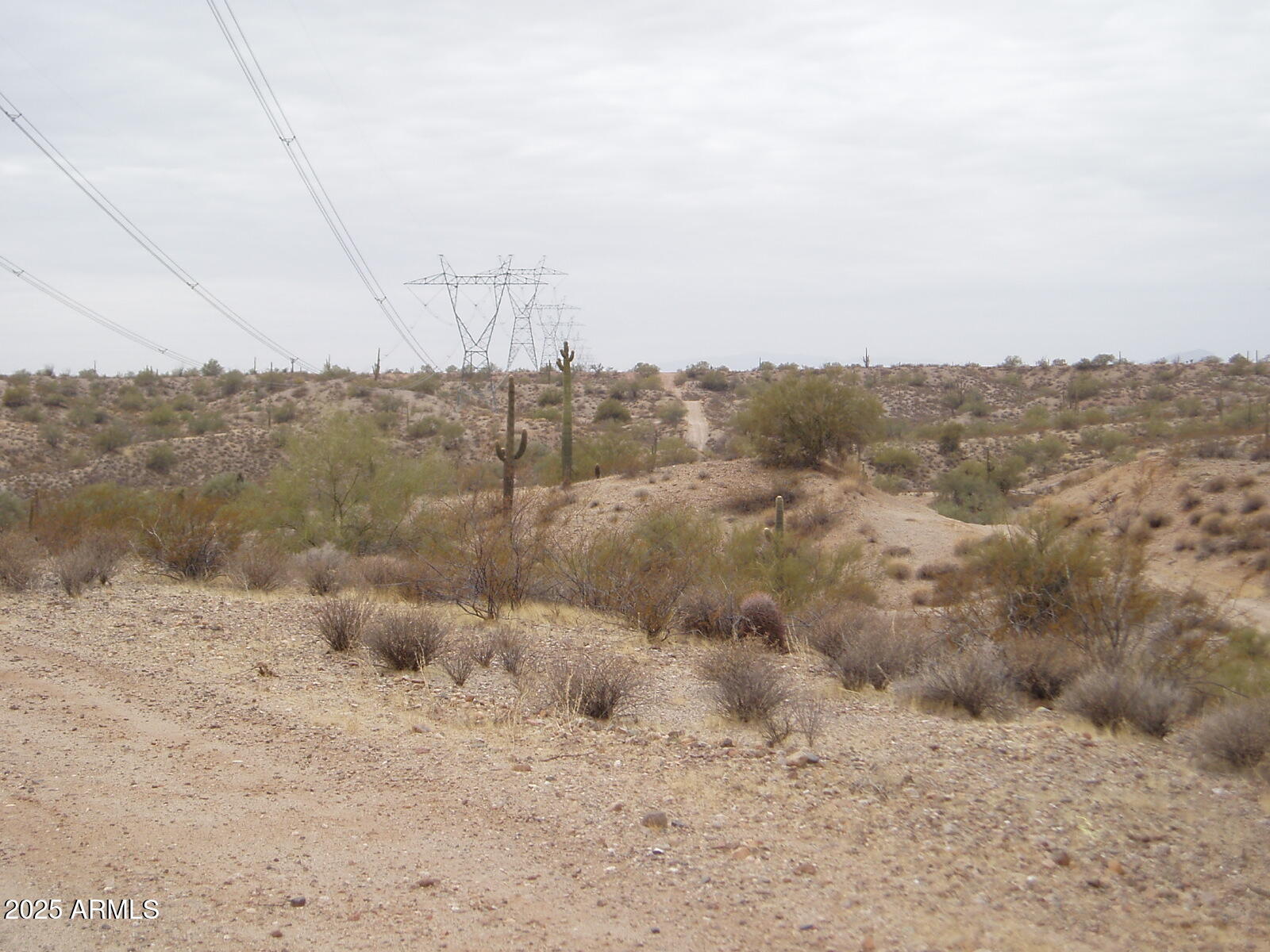 28700 West Dove Valley Road, Unit 6 PARCELS Wittmann, AZ 85361 - Photo 1 of 11 a view of a dry field
